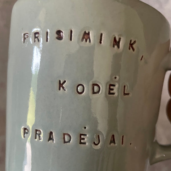 Blue mug with saying in Lithuanian