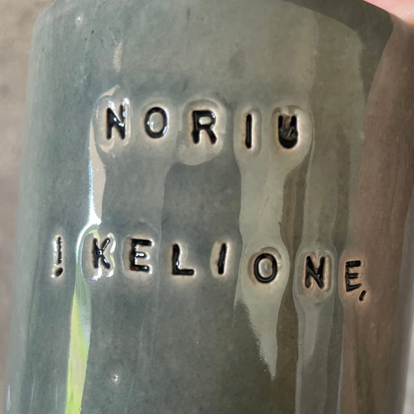 Set of small grayish mugs