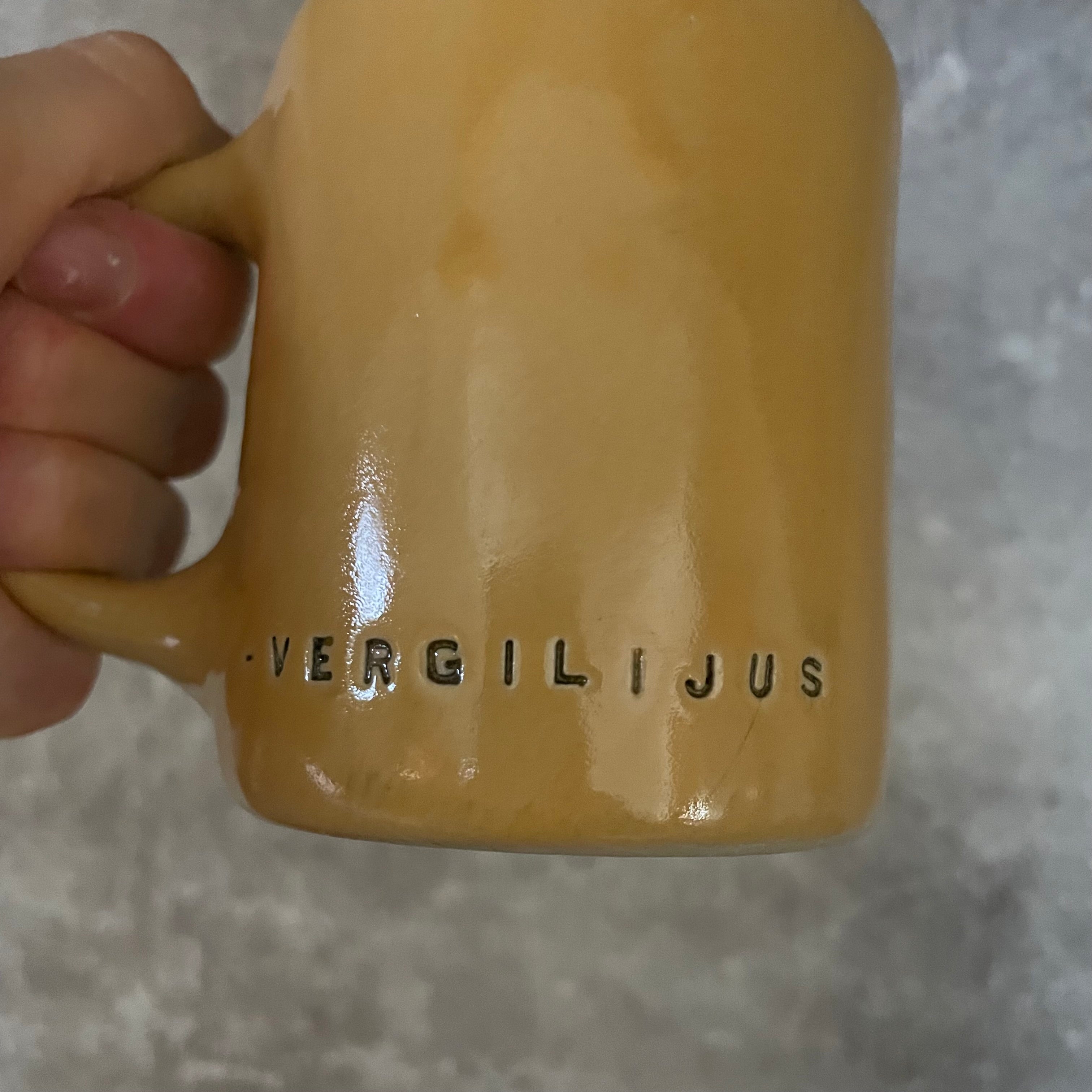 Yellow ceramic mug with quote by Vergil