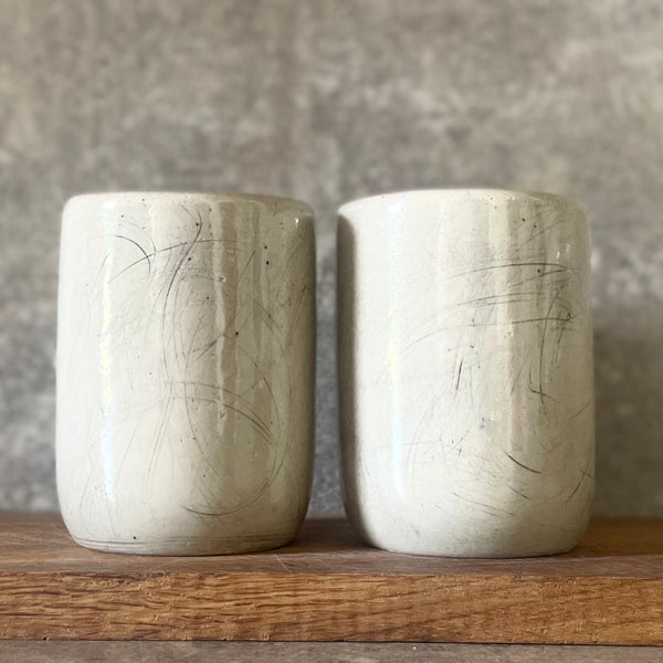 Two big ceramic tumbler mugs without handle about work