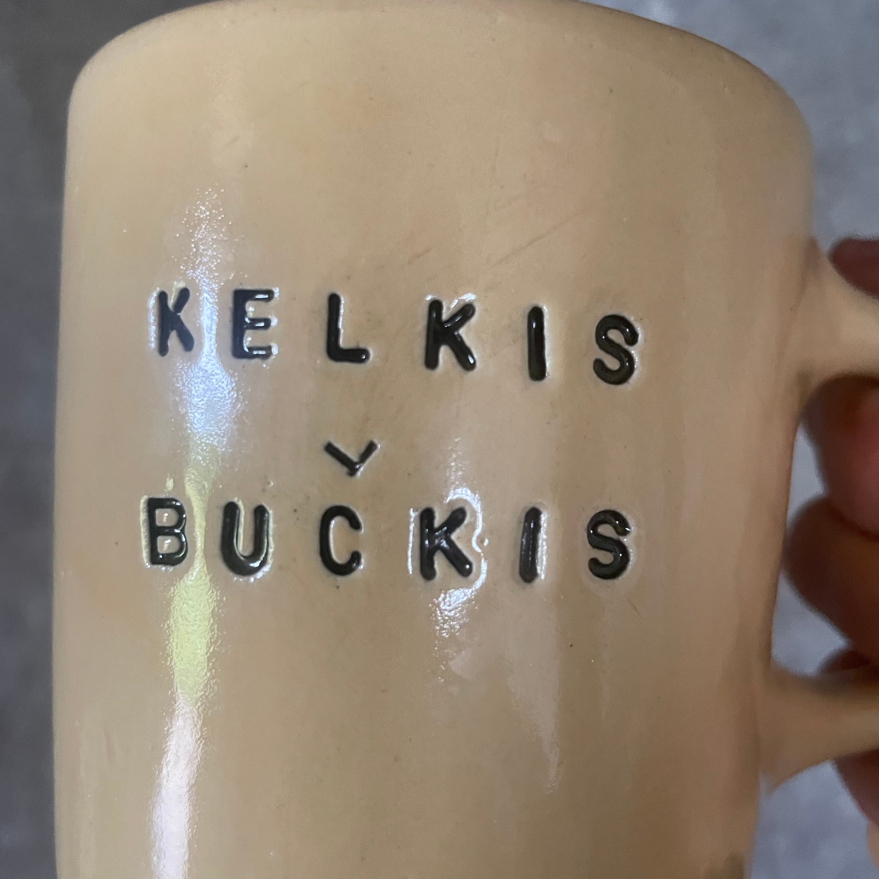 Puodelis geltonas KELKIS BUČKIS
