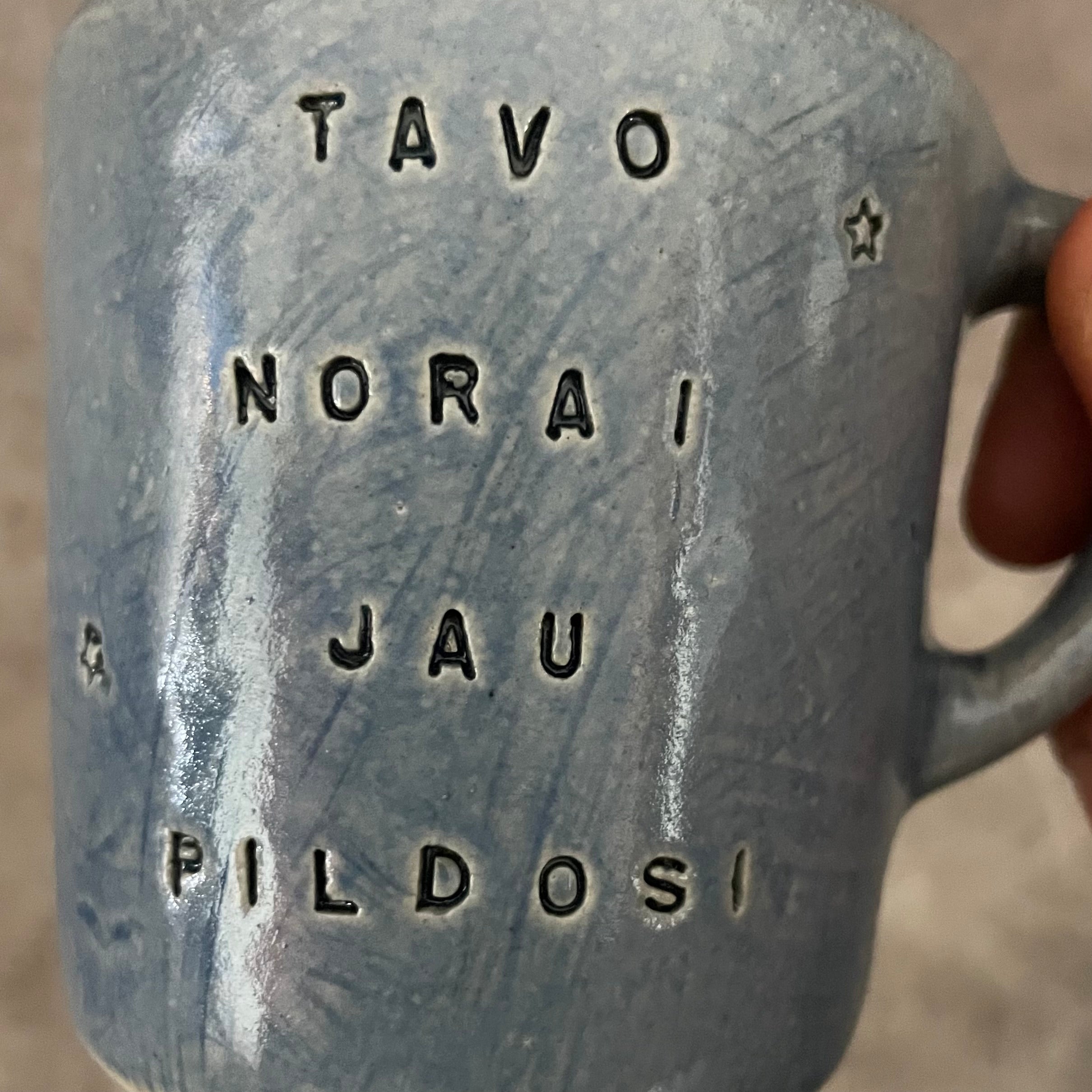 Small blue mug with magic words