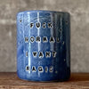Deep blue mug with magic saying