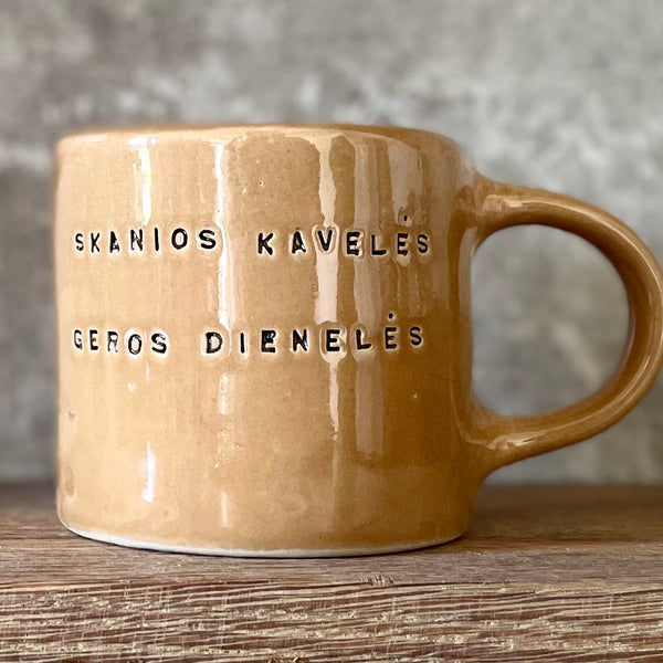 Brownish mug with good wishes