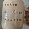 Pink mug with saying in Lithuanian