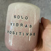 Pale pink mug with saying in Spanish
