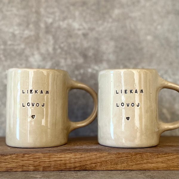 Sweet beige mugs for a couple