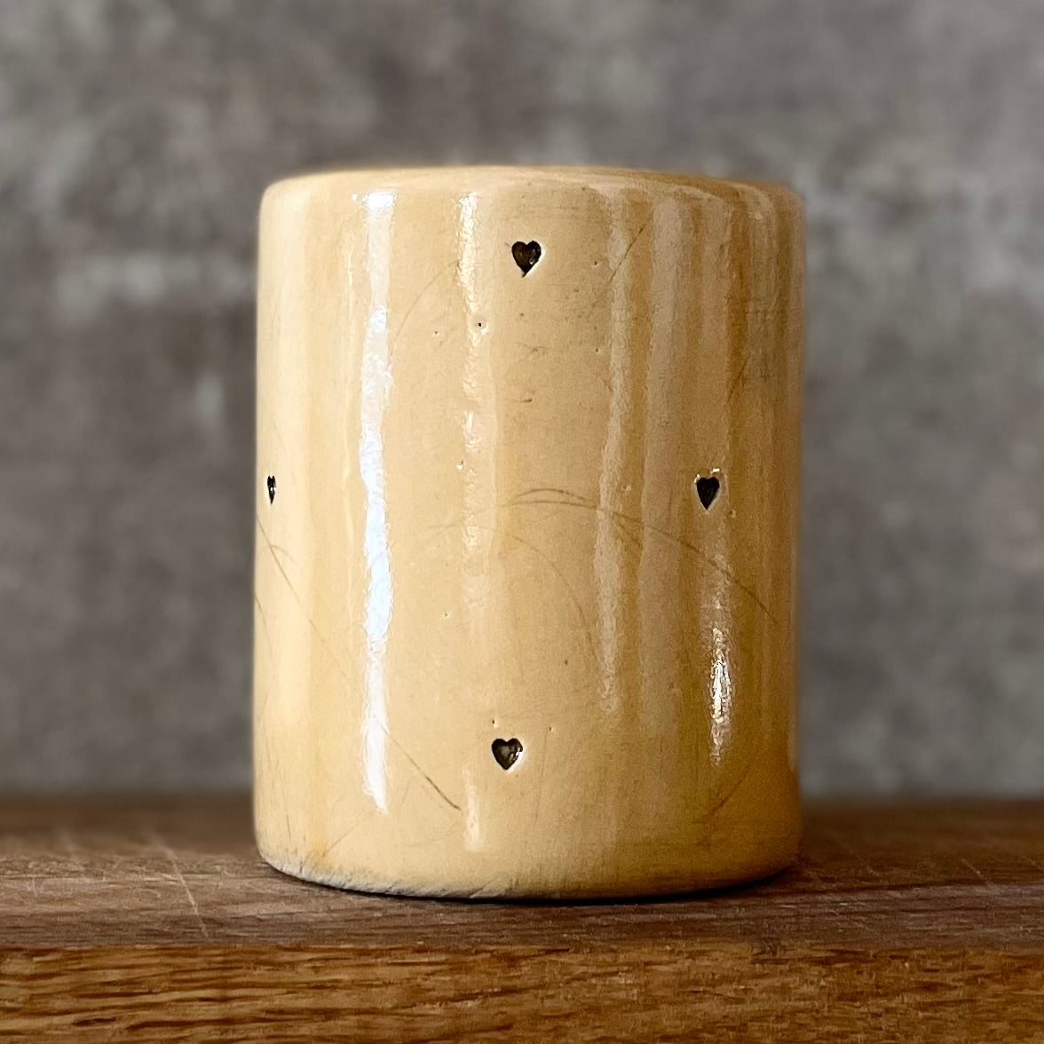 Yellow mug with saying in Spanish