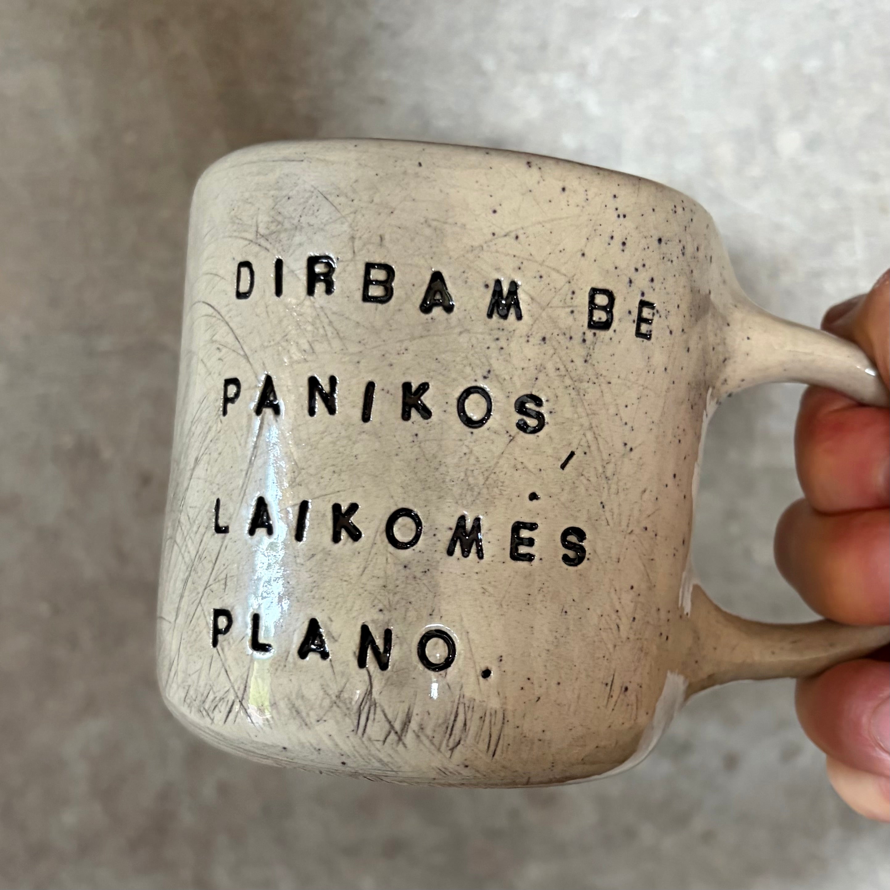 Speckled medium mug with words about work