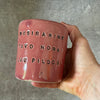 Pink mug with calming words without handle