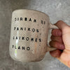 Speckled mug with words about work - another