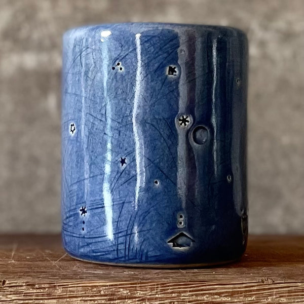 Deep blue mug with magic saying