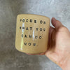 Bright yellow tumbler for motivation