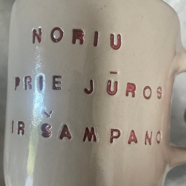 Rausvas puodelis ŠAMPANO