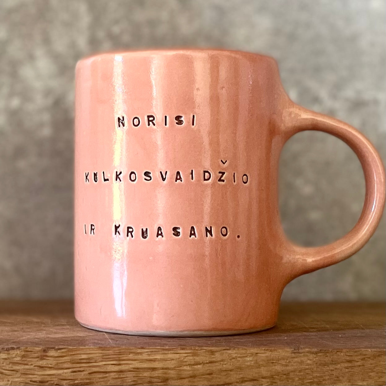 Pink mug with funny phrase in Lithuanian