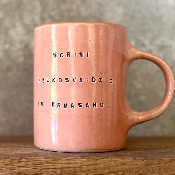 Pink mug with funny phrase in Lithuanian