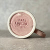 pink ceramic mug with saying